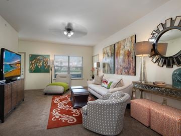 North Little Rock apartment for rent - a living room with a couch and chairs and a television