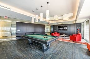 Washington apartment for rent - A room with a pool table and a television.