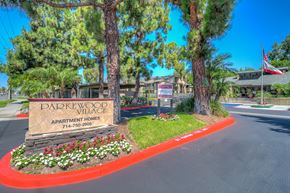 Anaheim apartment for rent - the sign at the entrance to dickenwood village apartments