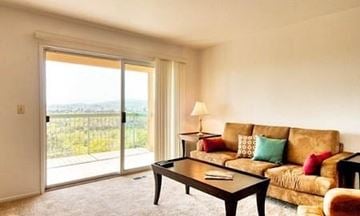 Redding apartment for rent - a living room with a couch and a coffee table