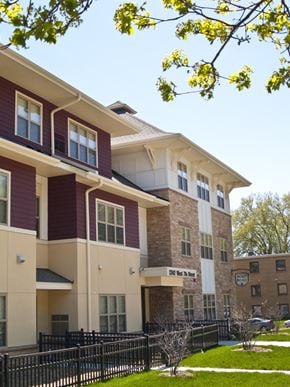 St. Paul apartment for rent - Apartment building with a sign that says "208 N. 14th St."