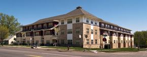 St. Paul apartment for rent - A large building with a mix of beige and brown bricks.