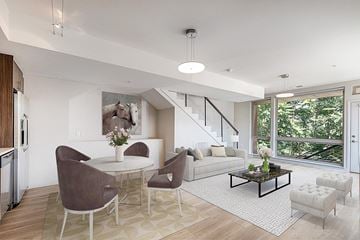 Denver apartment for rent - a living room and dining room with a table and chairs