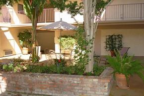 Northridge multi-family for rent - Courtyard sitting area at Canby Court, Northridge, CA