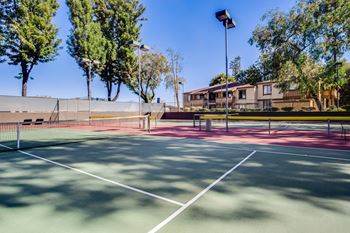 Four lighted tennis courts