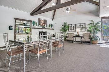 Community clubhouse with tv, living & dining areas