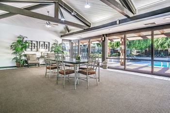 Community clubhouse with tv, living & dining areas