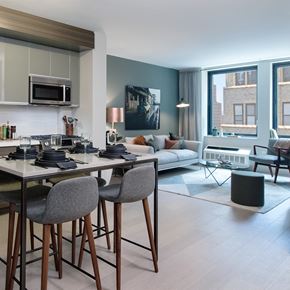New York apartment for rent - a kitchen and living room with a table and chairs
