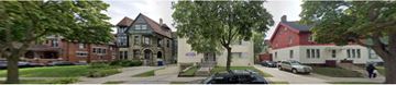 Madison triplex for rent - a view of a street with houses and trees