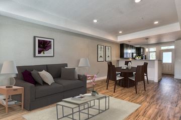 Fort Collins apartment for rent - a living room and dining room with a couch and a table