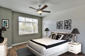 Fort Collins apartment for rent - Village on Redwood interior bedroom with large window and ceiling fan