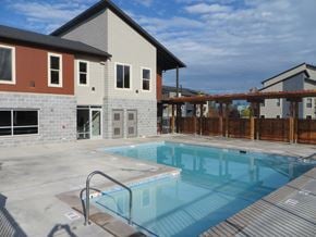 Arlington apartment for rent - a swimming pool in front of a house
