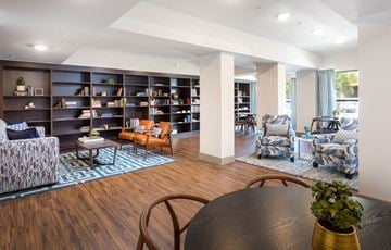 Camarillo apartment for rent - A living room with a black table and chairs.