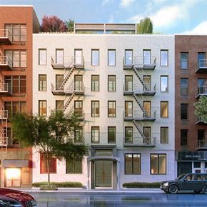 New York apartment for rent - a building with a lot of windows and a street
