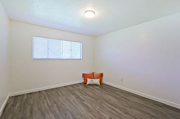 Phoenix apartment for rent - a living room with a chair and a window