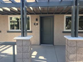 Las Vegas apartment for rent - the front entrance of a building with a black door