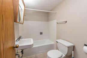 Princeton apartment for rent - a bathroom with a toilet and a sink and a bath tub
