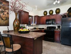 Jonesboro apartment for rent - a kitchen with a counter with a bowl of fruit on it