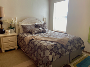 Springdale apartment for rent - a bedroom with a bed and a window
