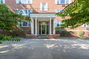 Shaker Heights apartment for rent - the front of a brick building with a glass door