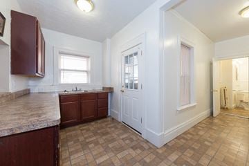 Cleveland Heights apartment for rent - a kitchen with a counter top and a door