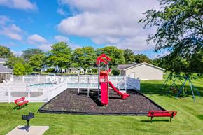 Swartz Creek townhouse for rent - our apartments have a playground for your kids to play