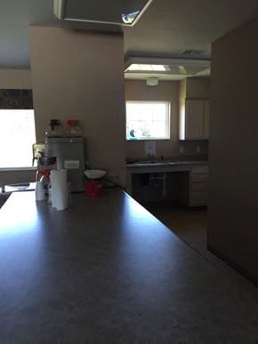 Mt. Morris townhouse for rent - a kitchen is being remodeled with a long counter