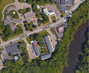 Flushing townhouse for rent - a map of a parking lot with a road and a building