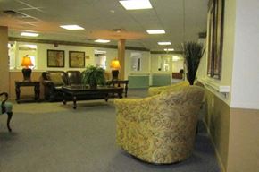 Flint townhouse for rent - a living room with a couch and a table