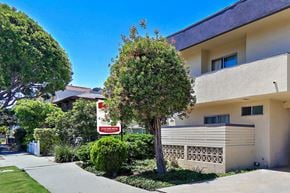 Los Angeles apartment for rent - an apartment building with a street sign in front