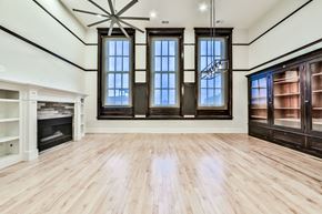 Chicago apartment for rent - the living room has a fireplace and a large windows
