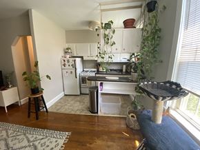 Philadelphia apartment for rent - an aerial view of a kitchen with a stove refrigerator and sink