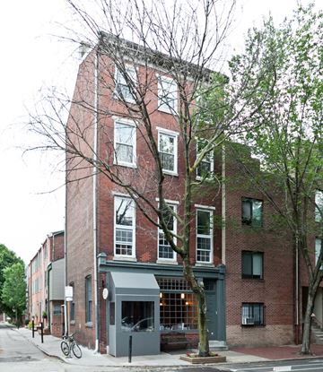 Philadelphia apartment for rent - a tall brick building on a city street