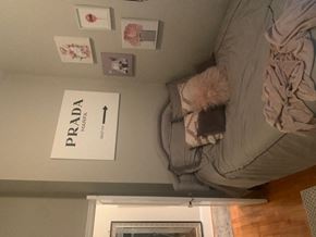 Philadelphia apartment for rent - a bed with a blanket and pillows on top of it
