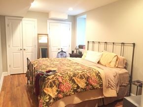 Philadelphia apartment for rent - a bedroom with a bed and a closet and a door to a bathroom