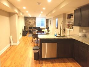 Philadelphia apartment for rent - an open kitchen and living room with a dining room in the background