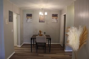 S. Weymouth apartment for rent - A dining room with a wooden table and chairs.