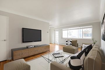 Denver apartment for rent - a living room with a couch and a television