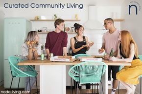 Brooklyn apartment for rent - A group of people are gathered around a table with sandwiches in front of them.