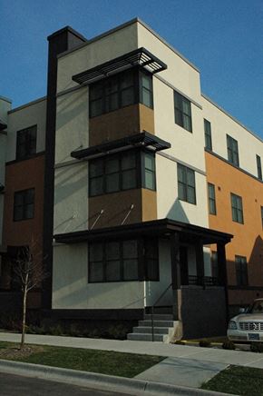 Minneapolis apartment for rent - A modern building with a mix of beige, brown and black colors.