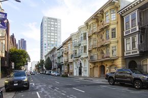 San Francisco apartment for rent - A street scene with cars and buildings.