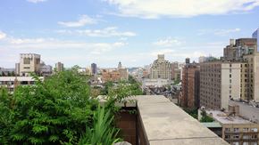 New York apartment for rent - a view of the city from the roof of a building