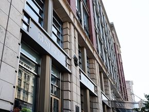 New York apartment for rent - a building with a sign on the side of it