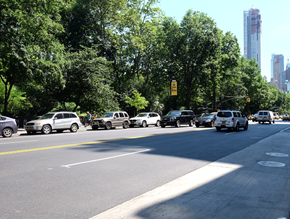 New York apartment for rent - a busy city street with cars driving down it