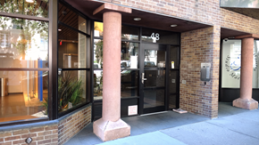 New York apartment for rent - the front entrance of a building with glass doors