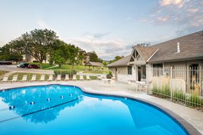 Bellevue apartment for rent - a swimming pool in front of a house