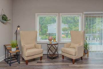 Roanoke apartment for rent - a living room with two chairs and two windows