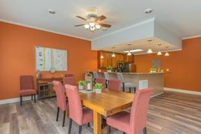 Roanoke apartment for rent - a dining room with a wooden table and chairs