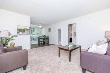 Studio City apartment for rent - a living room with a couch and a table