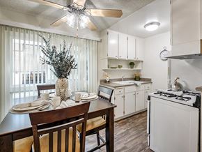 Northridge apartment for rent - a kitchen and dining room with a table and chairs